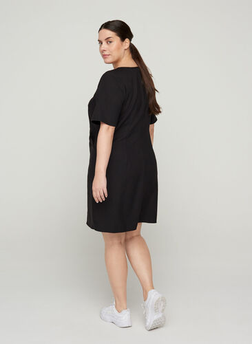 Plain-coloured sheath dress with a v-neck, Black, Model image number 1