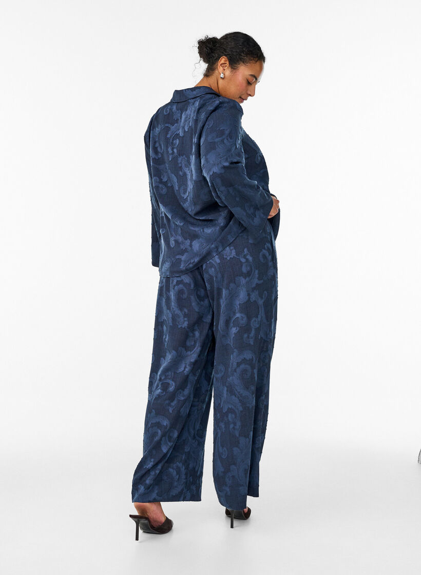 Loose trousers with a textured tone-on-tone pattern, Blue, Model image number 1