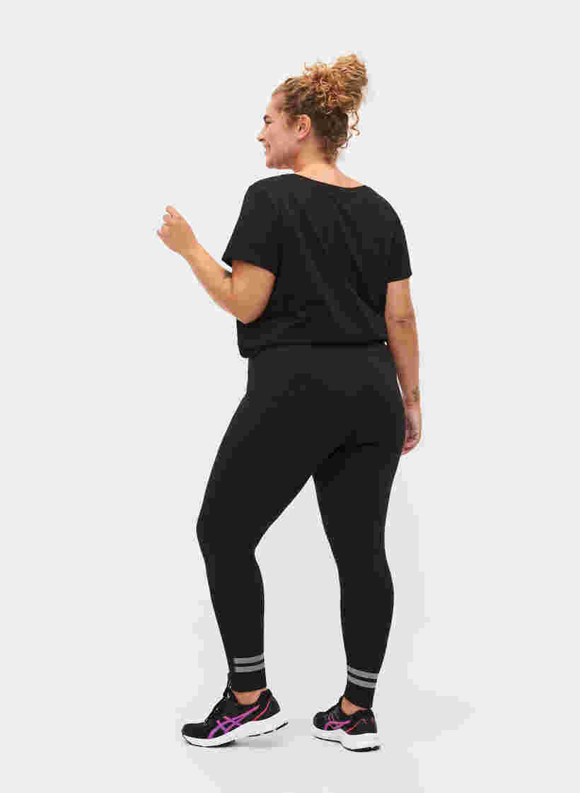 Workout leggings with reflex and inner fleece, Black, Model image number 1