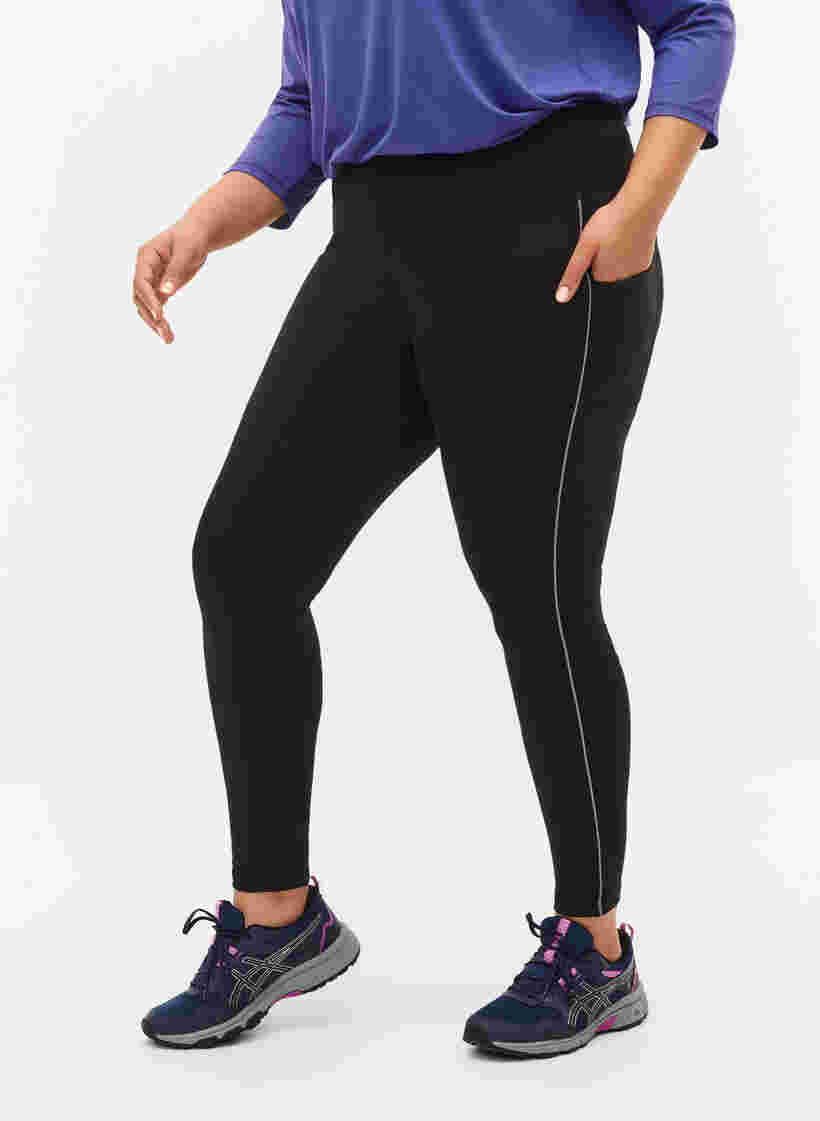 Sports tights with reflective details and side pocket, Black, Model image number 2