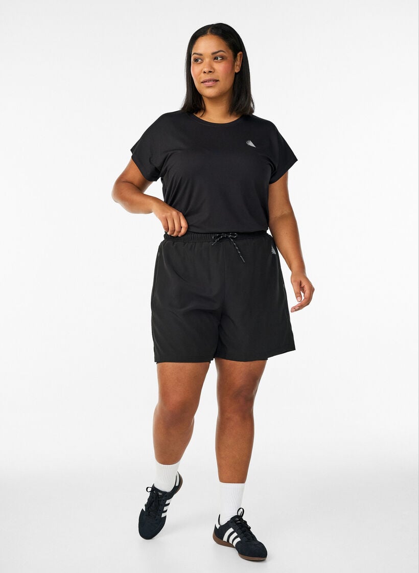 Training shorts with inner shorts and a phone pocket, Black, Model