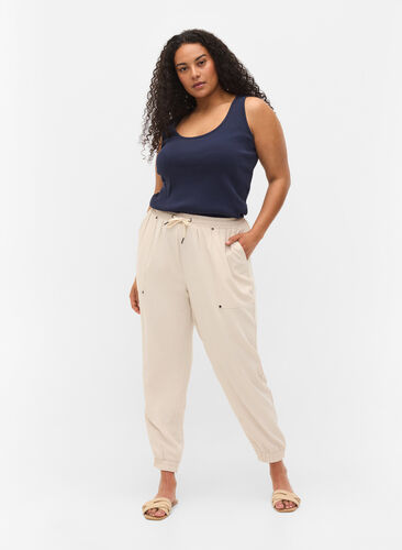 Trousers with pockets and elasticated trim, Warm Sand, Model image number 0