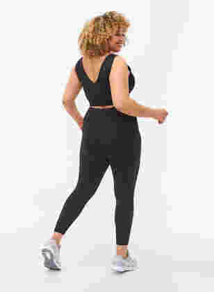 Solid-coloured gym leggings, Black, Model