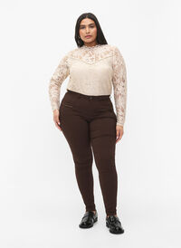 Close-fitting trousers with zipper details, Coffee Bean, Model