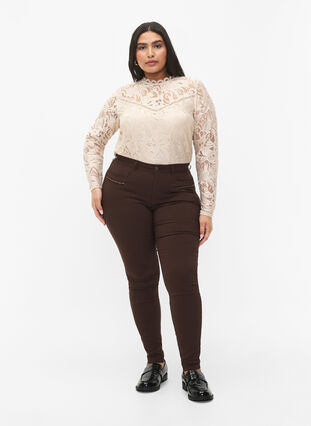 Close-fitting trousers with zipper details, Coffee Bean, Model image number 0