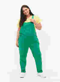 Coloured denim overalls, Holly Green, Model