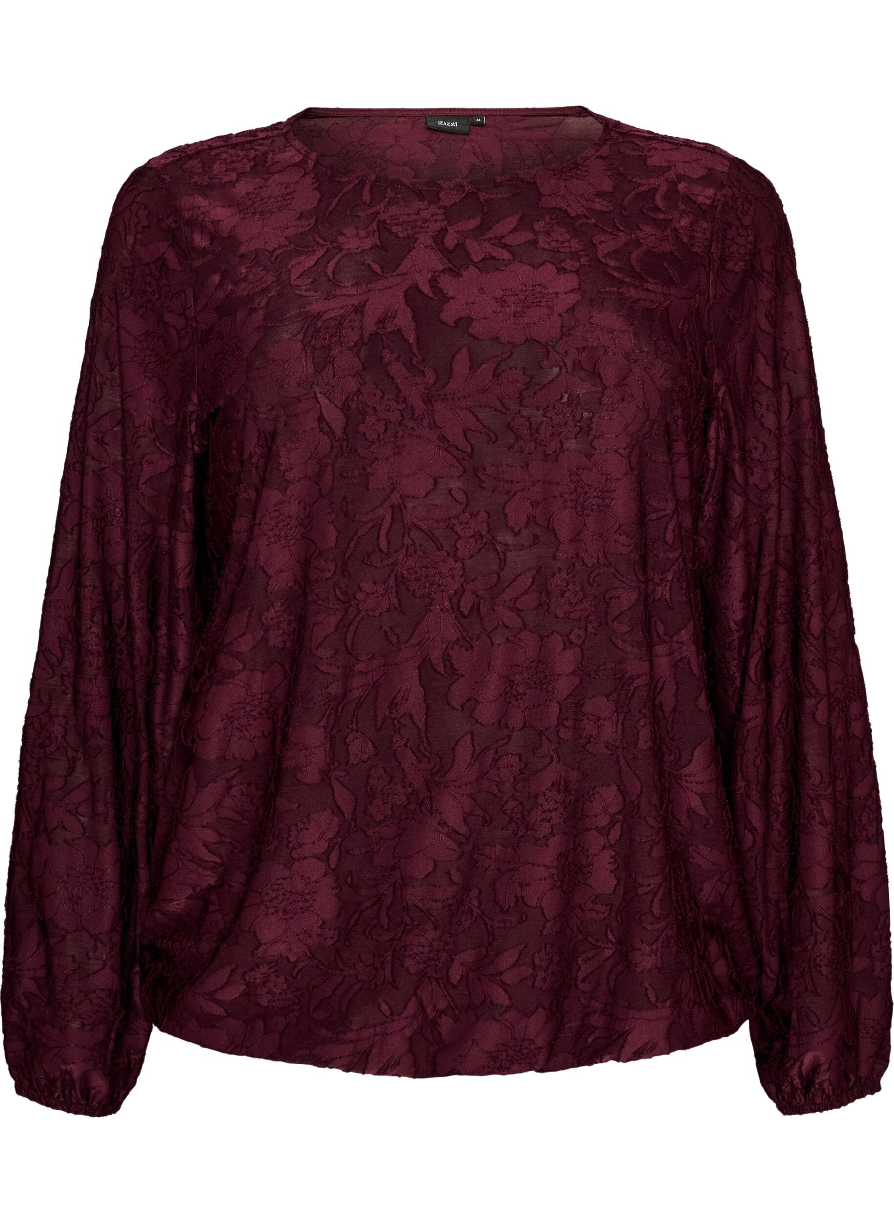 Sheer blouse with floral texture and long sleeves