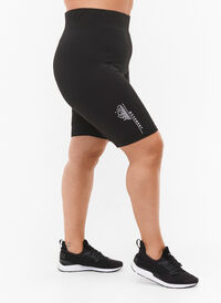 Tight-fitting workout shorts with logo, Black, Model
