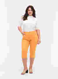 Close-fitting Emily capri trousers, Mock Orange, Model