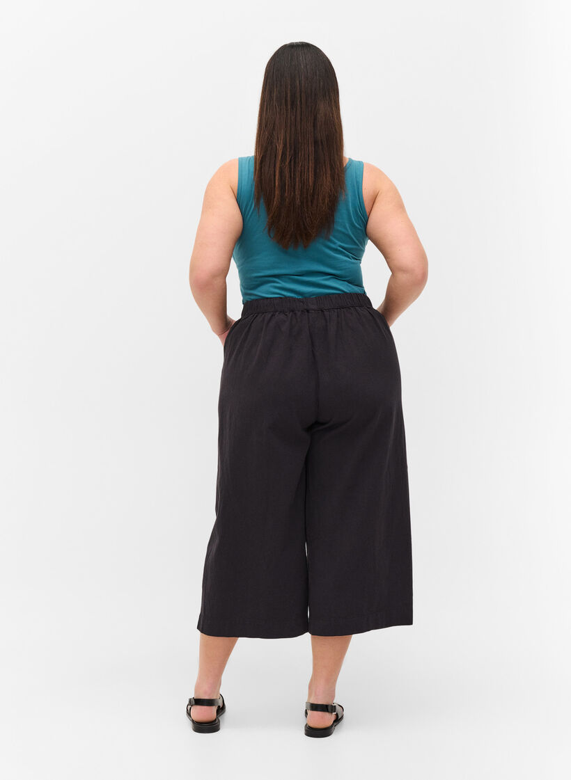 Loose culotte trousers in cotton, Black, Model image number 1