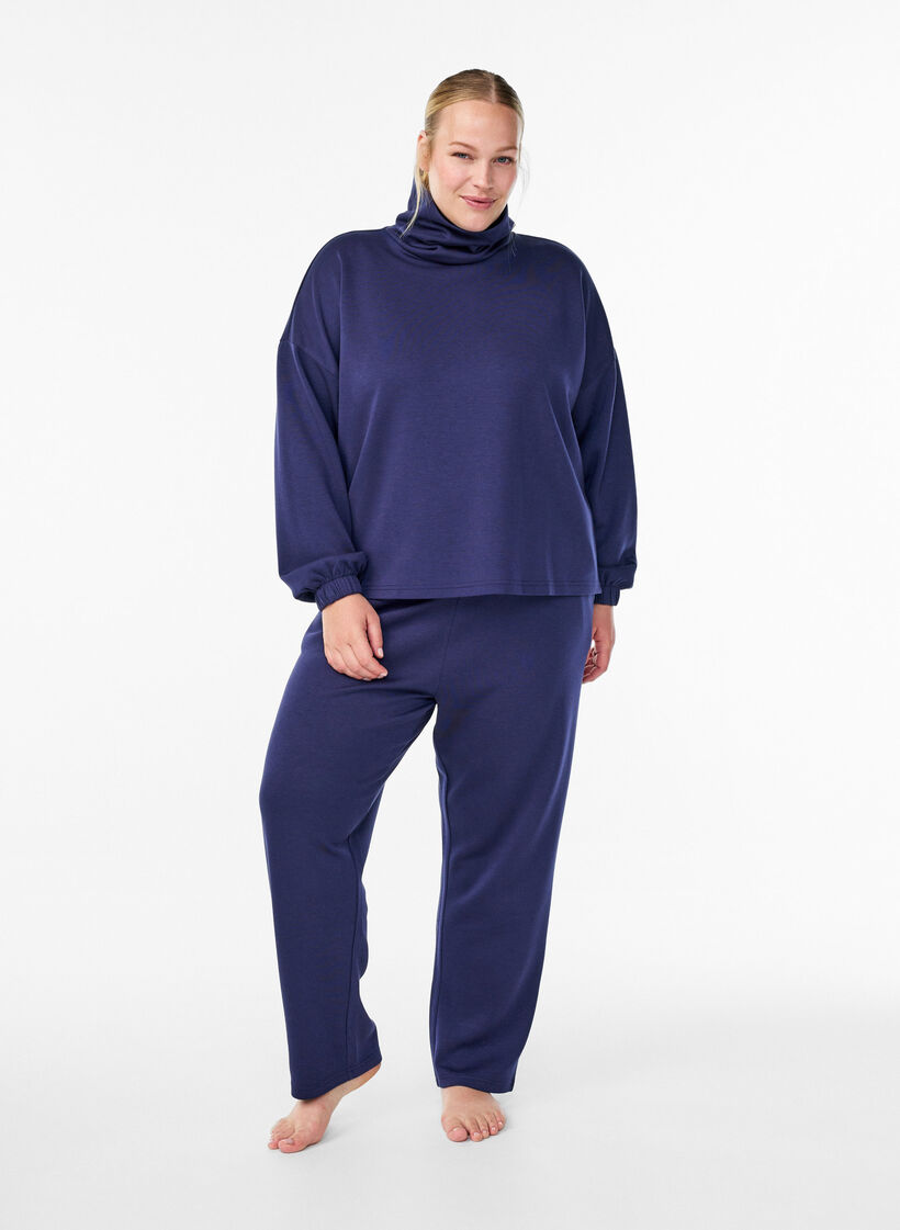 Loose trousers in modal mix, Blue, Model image number 0