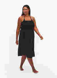 Beach dress in viscose with smock top, Black, Model
