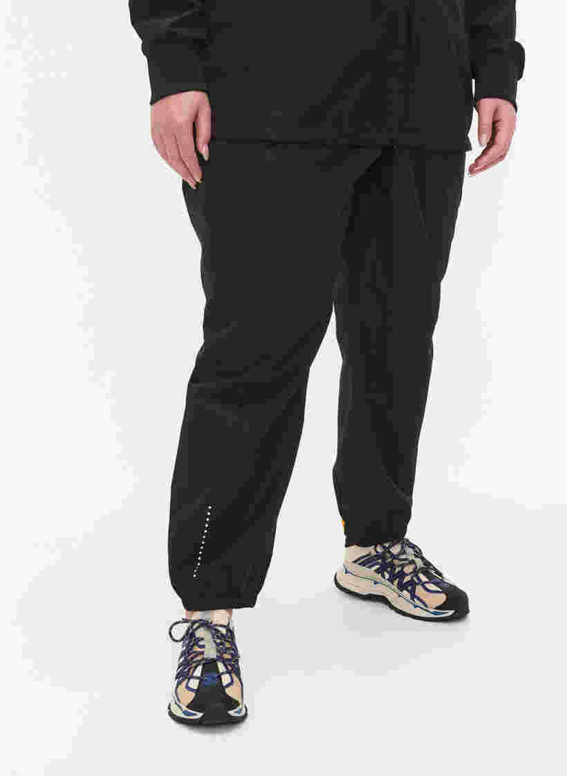 Rain trousers with reflectors, Black w. Reflex, Model image number 3
