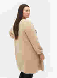 Long knitted cardigan with balloon sleeves, Nomad Mel., Model