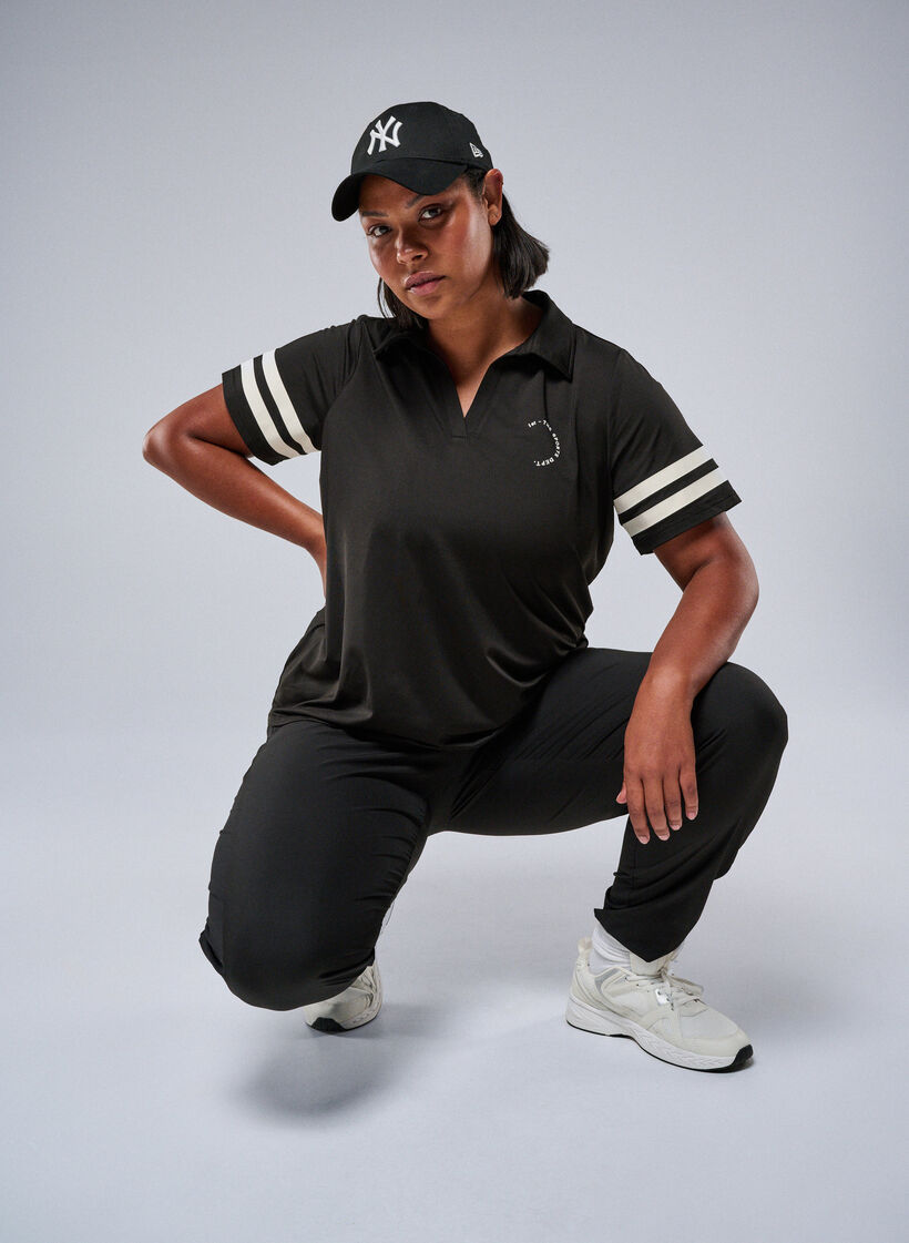 Sporty polo shirt with stripe details, Black, Image image number 0