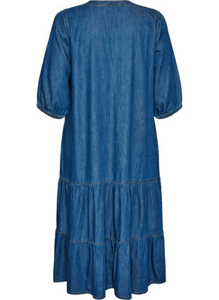 tiered denim maxi dress This tiered denim maxi dress features delicate ruffled details, exuding effortless boho charm. Ideal for daily wear, it offers relaxed fit and vintage-inspired beauty.