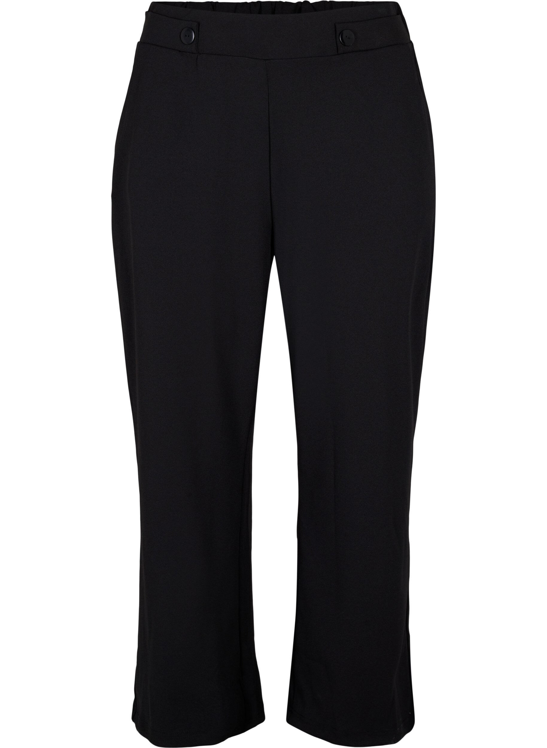 Loose trousers with pockets
