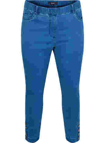 Cropped jeggings with buttons on the leg ends