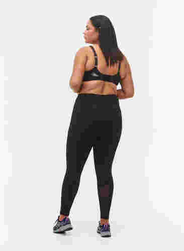 CORE, POCKET TIGHTS - Workout Leggings with side pocket, Black, Model image number 1