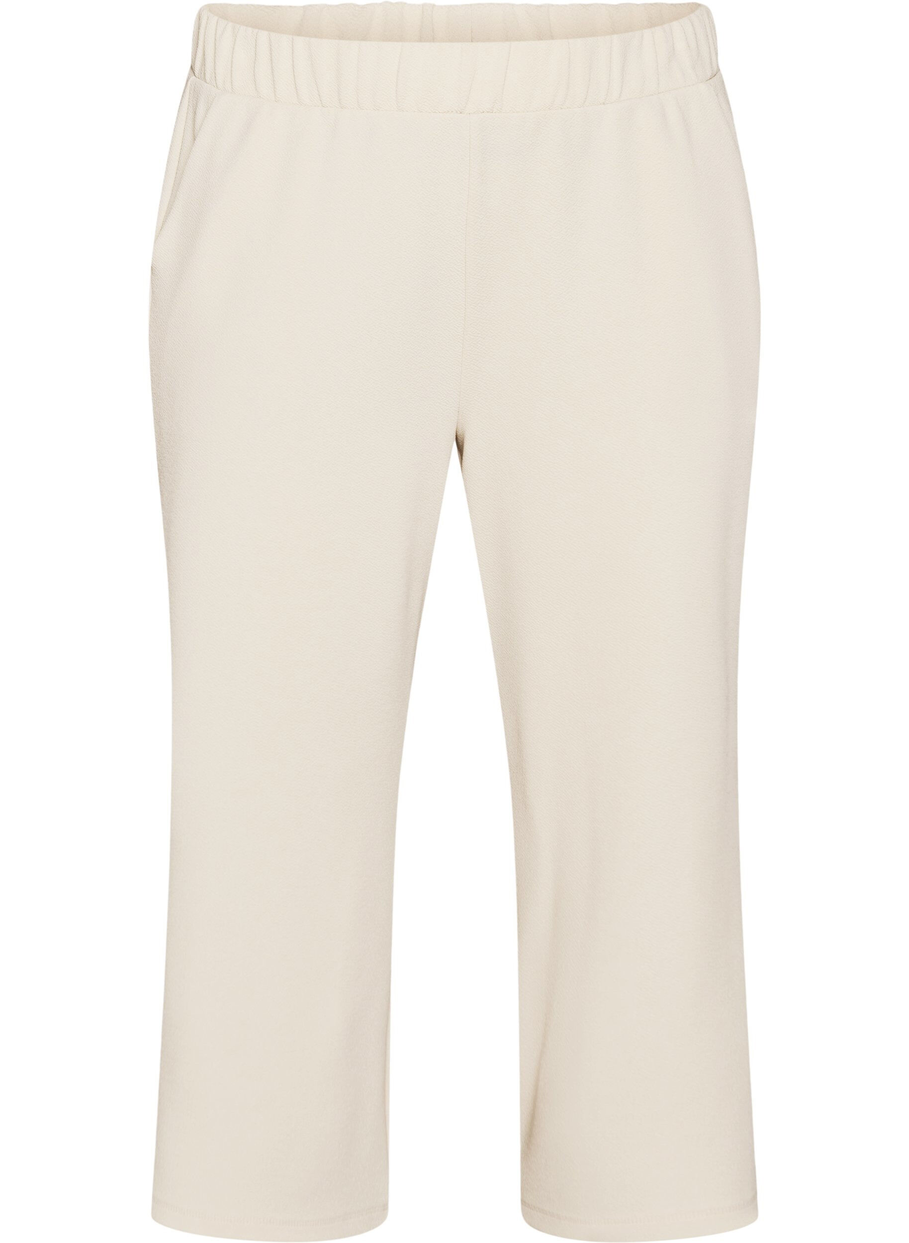 Loose trousers with 7/8 length