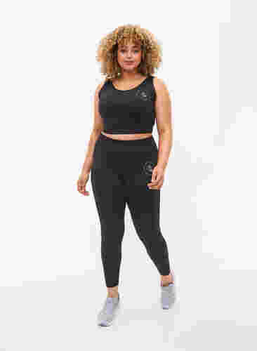 Solid-coloured gym leggings, Black, Model image number 3