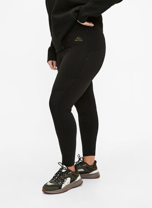 Stretchy and durable exercise leggings with pockets, Black, Model image number 0