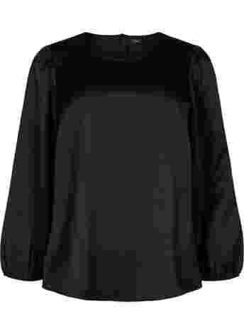 Long sleeved blouse with round neck