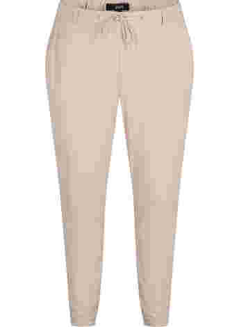 Trousers with pockets and drawstring