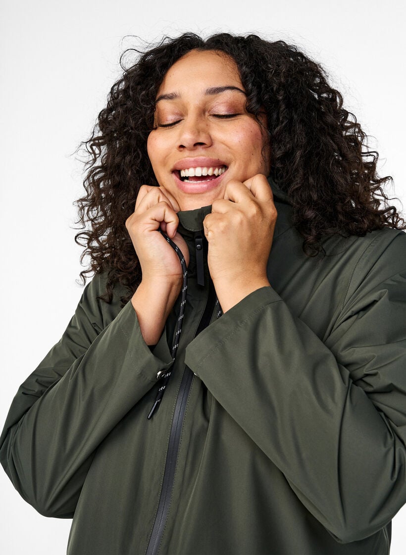 Rain jacket with pockets and hood, Green, Model image number 3