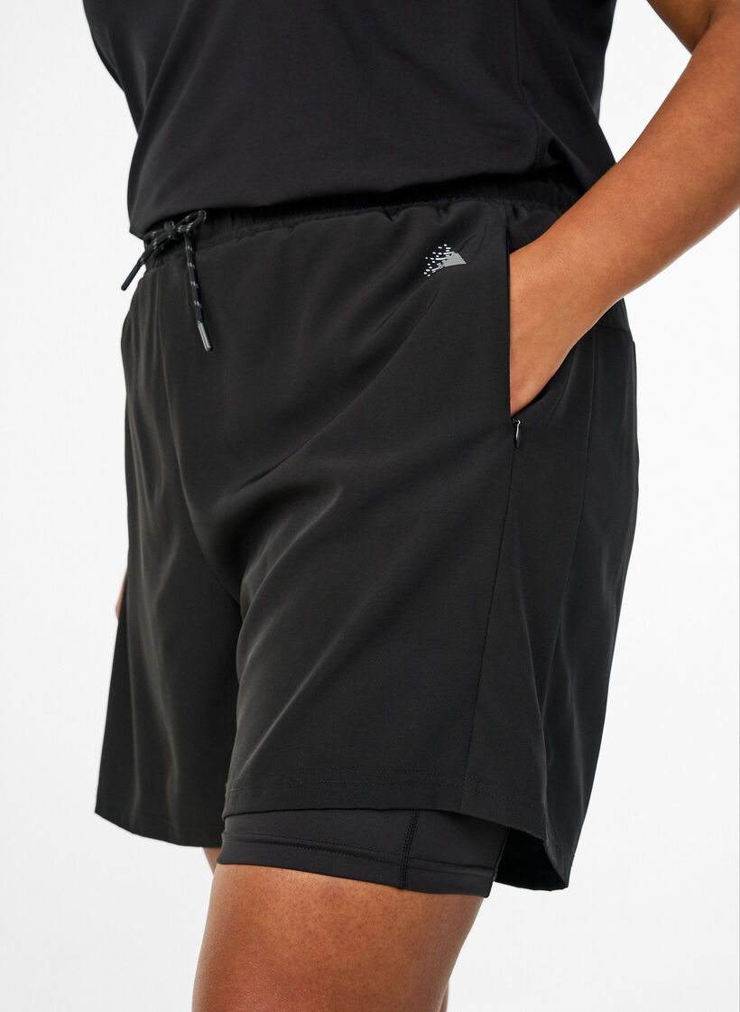 Training shorts with inner shorts and a phone pocket, Black, Model image number 3