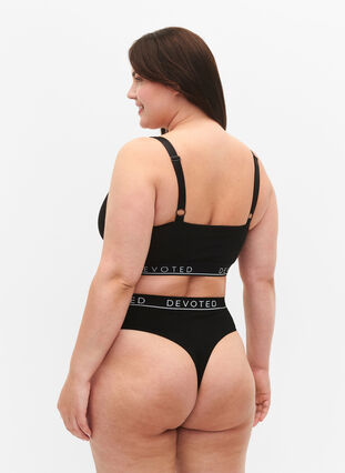 G-string in ribbed fabric with regular waist, Black, Model image number 1
