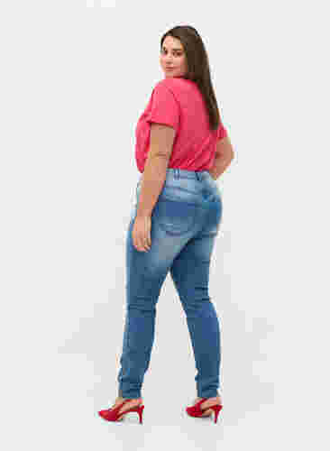 Super slim Amy jeans with slit and buttons, Light blue, Model image number 1