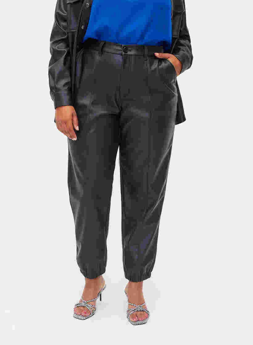 Trousers in faux leather, Black, Model image number 2