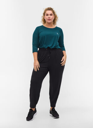 Loose viscose trousers with pockets, Black, Model image number 0