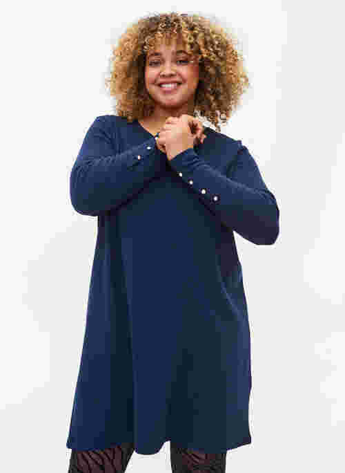 Tunic with long sleeves and button details