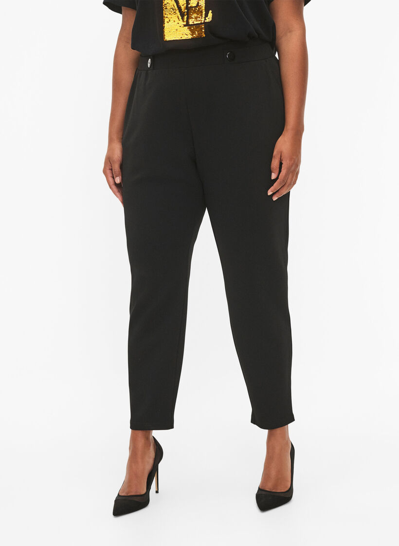 Trousers with pockets and decorative buttons, Black, Model image number 2