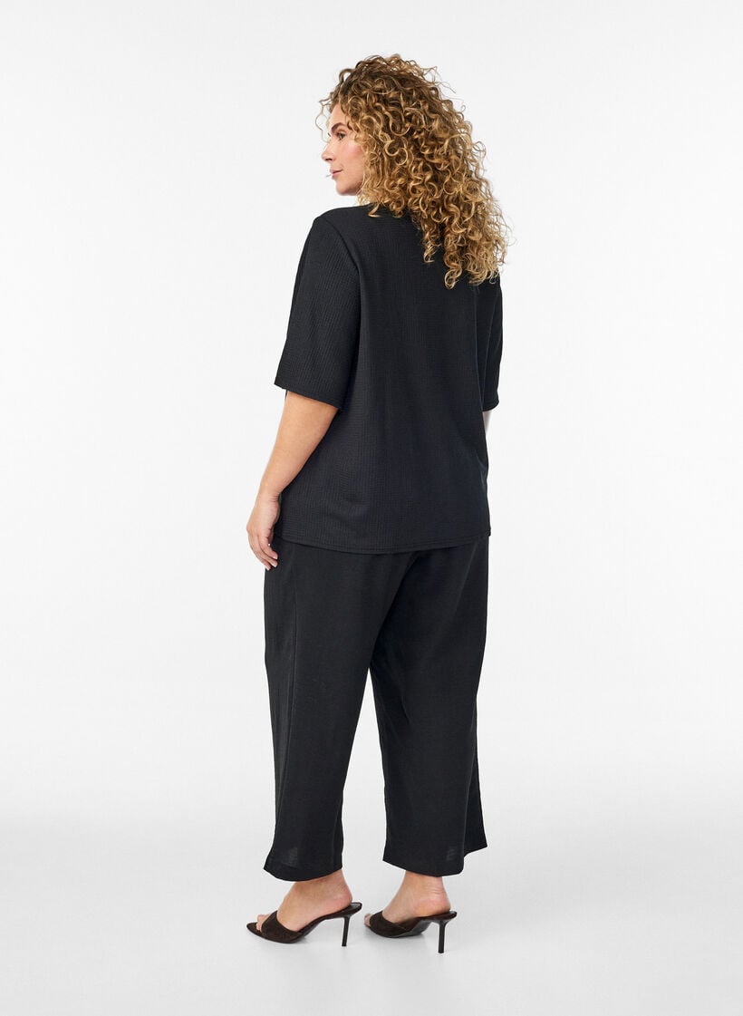 High-waisted culottes with an elasticated back, Black, Model image number 1