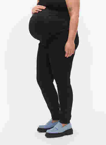Pregnancy jeggings with back pockets, Black, Model image number 2