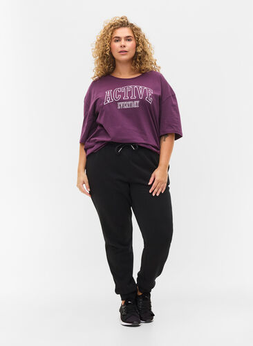 Sweatpants with tie string and pockets, Black, Model image number 0