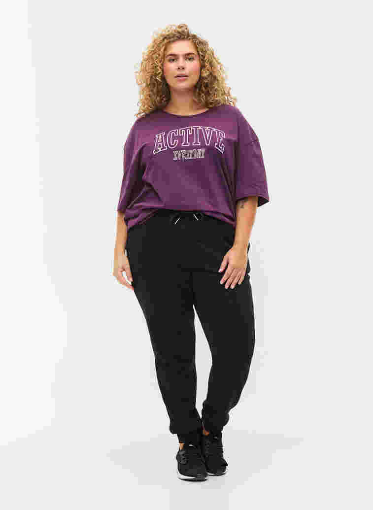 Sweatpants with tie string and pockets, Black, Model