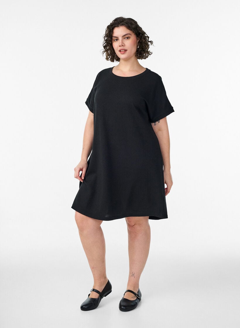 Short textured jersey dress with a round neck, Black, Model image number 1