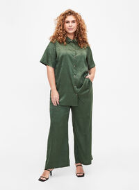 Trousers with textured pattern, Duck Green, Model