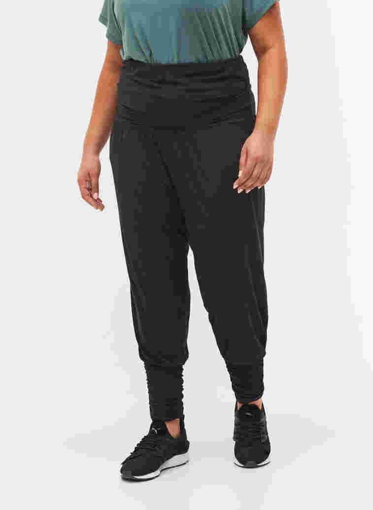 Loose viscose joggers with elastic trim, Black, Model image number 2