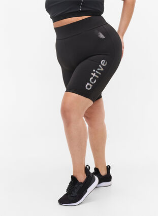 Close-fitting gym shorts with text print, Black, Model image number 2