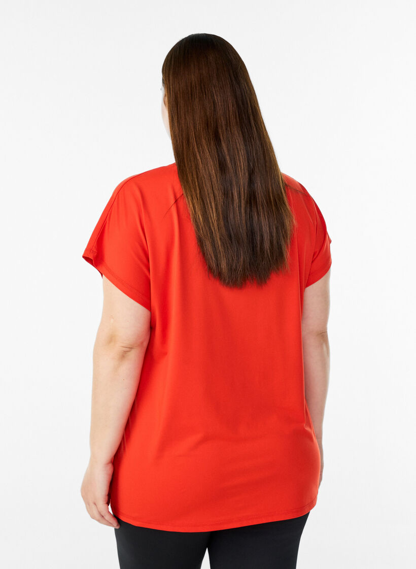 Solid-coloured training T-shirt, Orange, Model image number 2