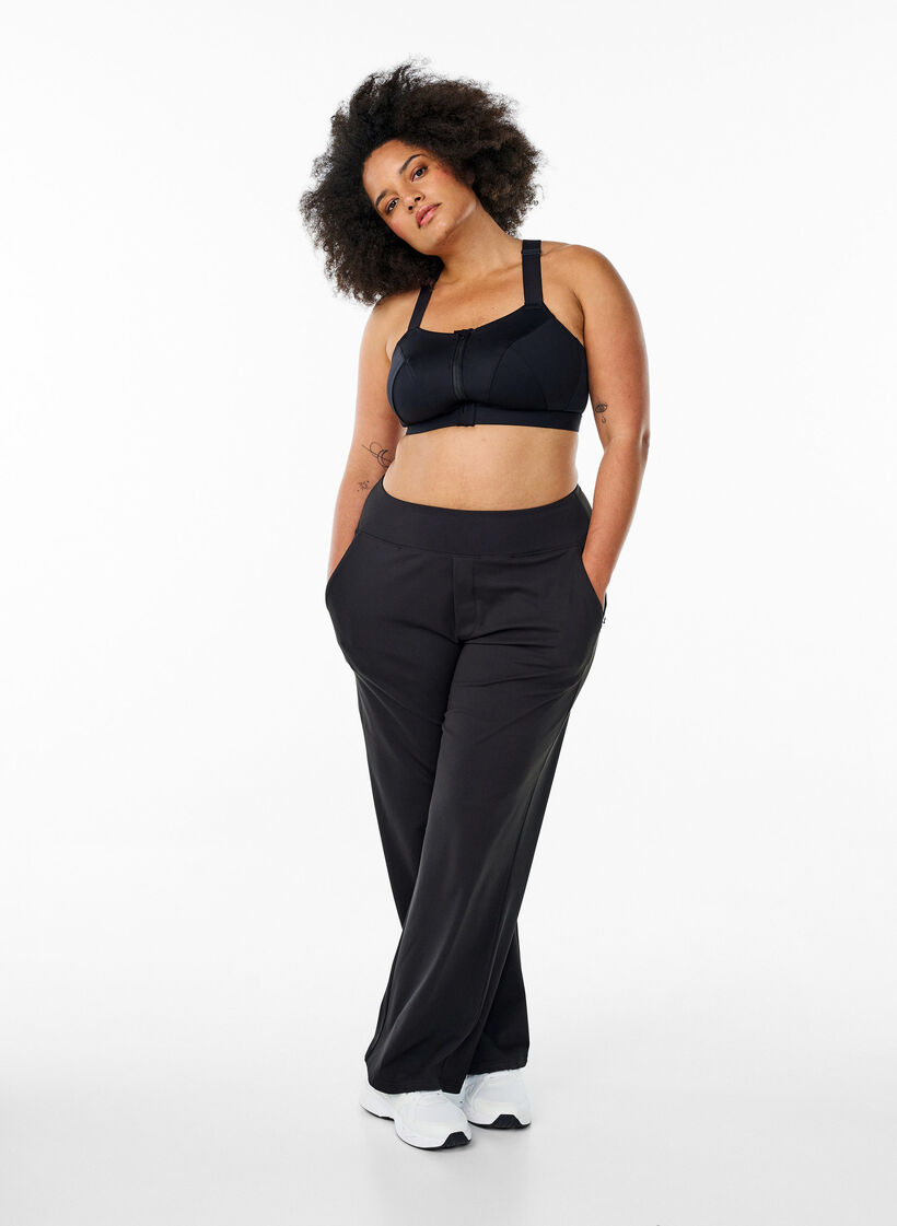 Stylish workout trousers with a slight flare, Black, Model