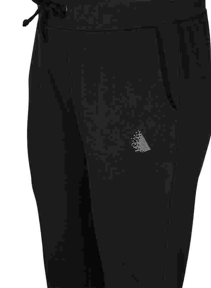 Plain sports pants with pockets, Black, Packshot image number 2
