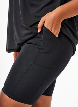 Tight-fitting high-waist shorts with pockets, Black, Model image number 2
