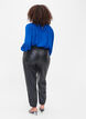 Trousers in faux leather, Black, Model image number 1