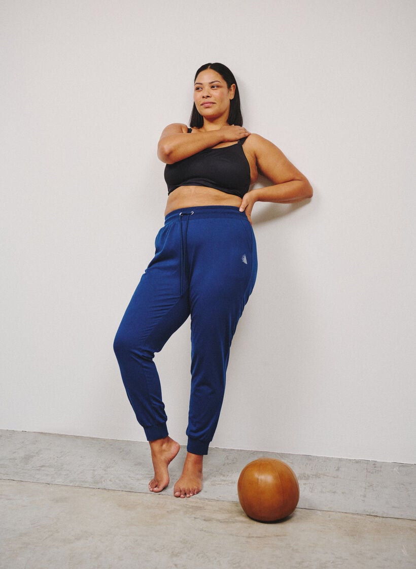 Loose tracksuit trousers with pockets, Blue, Image image number 0